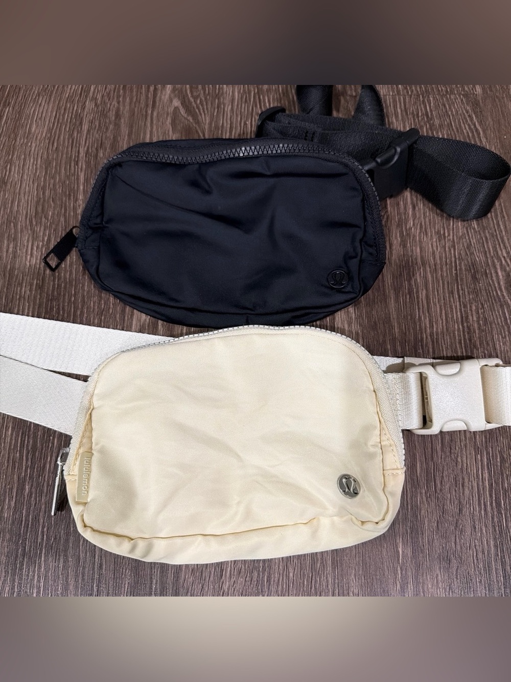 Set of Black and beige Lululemon everywhere belt bag